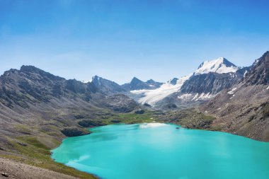 Wonderful mountain landscape, lake, highland, peak, beauty world Picturesque view near Alakul lake in Terskey Alatoo mountains, Tian-Shan, Karakol, Kyrgyzstan