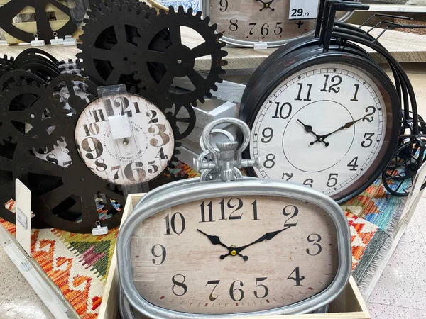 a display with a group of vintage watches, concept of time passing by, antique watches imitation, horizontal