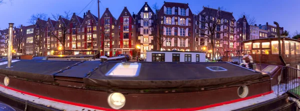 Panorama of the city waterfront of Amsterdam at sunset. — 图库照片