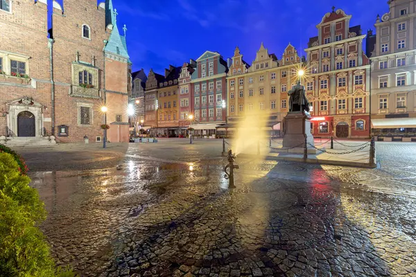 Scenic view of the market square in the early morning in night illumination. Wroclaw. Poland.