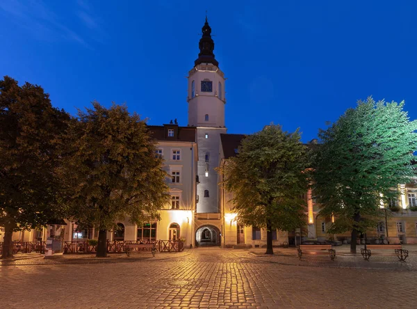 View of the old medieval market square and the facades of traditional colorful houses at dawn. Swidnica. Poland.