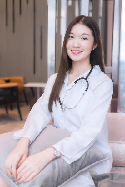 Asian Beautiful Young Smiling Woman Doctor Sitting Office Hospital — стоковое фото