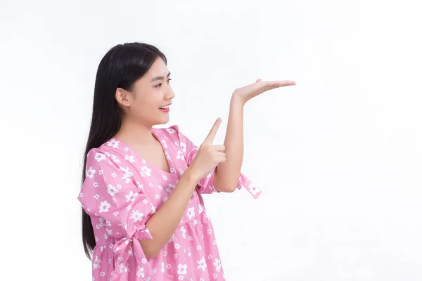 Asian Beautiful Female Black Long Hair Pink Shirt Shows Present — стоковое фото