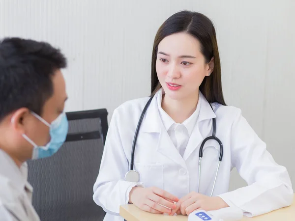 Professional Beautiful Young Asian Female Doctor Talking Man Patient His — Stock Photo, Image
