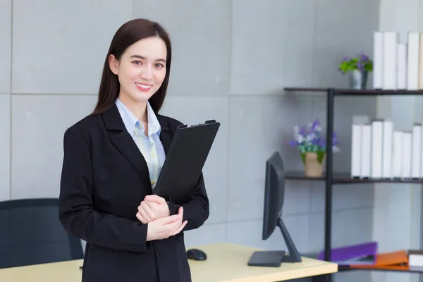 Professional Asian Business Young Woman Black Suit Smiles Happily While — Fotografia de Stock
