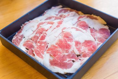 Jyo karobi is fresh beef raw sliced was served for Sukiyaki ,Korean grilled beef and Shabu or Yakiniku restaurant which it put on black plate.