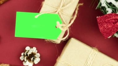 Box with twine and tag, background with copy space. Chroma key. Christmas card. View from above. Copy space - image. Camera zoom