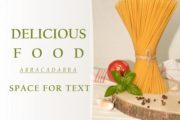 On the table is a pack of spaghetti tied with string. On a light background. Background with copy space