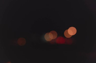 Geçmişi. Siyah üzerine renkli bokeh