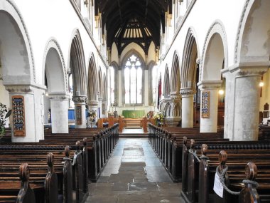 Central view of the church interior with numerous architectural arches