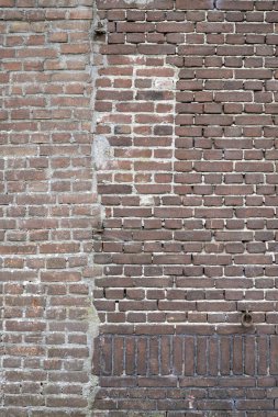 Restored masonry wall as background photo in the Netherlands