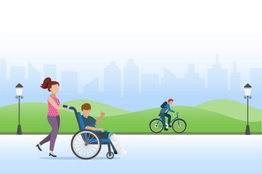 Woman help man with broken leg in plaster cast on wheelchair to public park for relaxation.