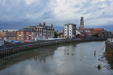 River view at high tide of High Street with the stump tower in the distance. Boston lincolnshire UK