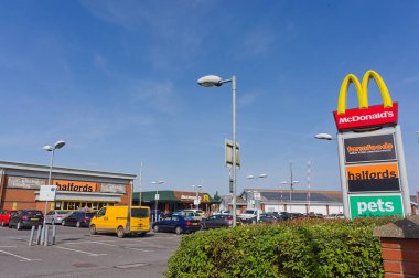 Queen street Retail Park with McDonalds billboard sign in foreground on a sunny summer's day. Boston England