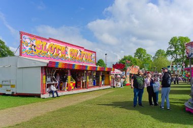 People at the annual May fair in the park on a sunny day. BOSTON Lincolnshire UK