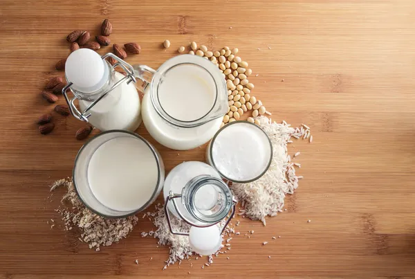 Variations Vegan Milk Alternatives Made Cereals Nuts Glasses Bottles Ingredients — Stock Photo, Image