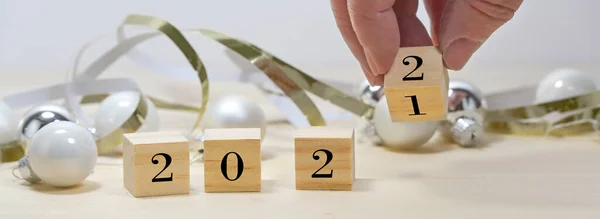 Hand Turning Wooden Cubes 2021 2022 New Year Panoramic Format — Stockfoto