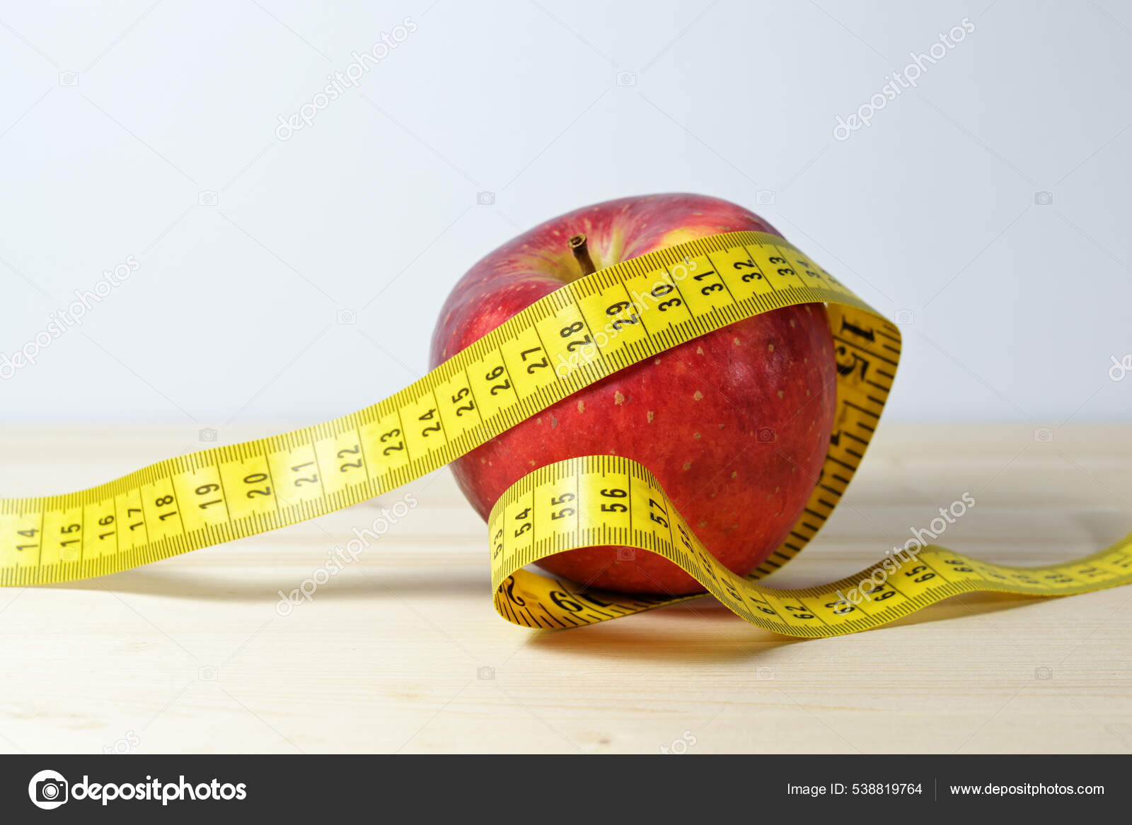 https://st.depositphotos.com/3765293/53881/i/1600/depositphotos_538819764-stock-photo-red-apple-measuring-tape-diet.jpg