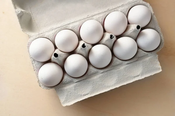 Organic White Eggs Cardboard Container Wooden Table High Angle View — Stock Photo, Image