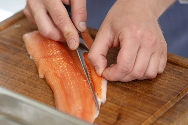 Hands Cook Remove Belly Flap Bones Fresh Raw Char Fish — Stockfoto