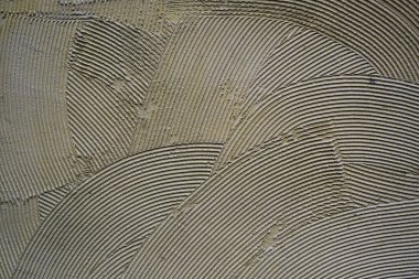 Soyut doku arka planı, yarı dairesel desenlerin duvar tasarımı eski yumuşak alçı ya da çimento, inşaat ve mimari konsepti, kopyalama alanı