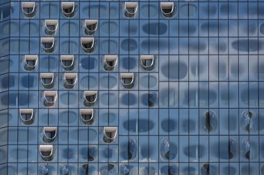 Elbphilharmonie, Hamburg concert hall, part of the glass facade, modern architecture in the historic warehouse city, landmark and tourist destination on the river Elbe in Germany, background texture