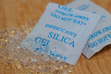 Silica gel as a granulate in a paper bag clipart