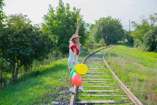 Contented Woman Walks Colored Balls Railroad High Quality Photo — Stock Photo, Image