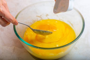 baking powder is added to the cup with ingredients