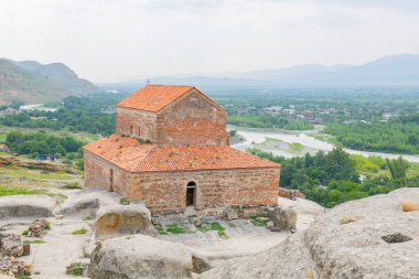 small ancient church on a hill in Uplistsikhe