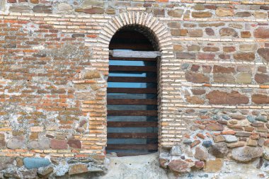 beautiful arched door with lattice in uplistsikhe in georgia