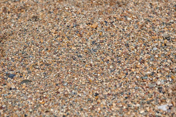 Texture de sable grossier sur la plage au bord du lac — Photo