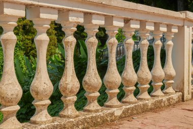 openwork fence in the botanical garden in Batumi. High quality photo