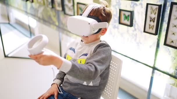 Kid Wearing Headset Moving Hands Touching Air Boy Playing Games — Stock Video