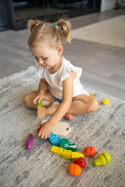 Cute Little Toddler Girl Playing Home Eco Wooden Toys Happy — Stockfoto