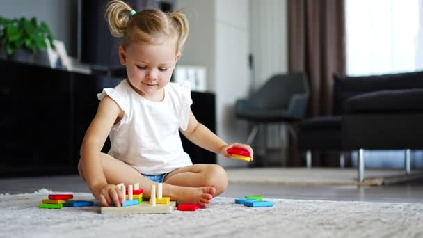 Cute Caucasian Little Girl Playing Floor Home Eco Wooden Toys — Stok video