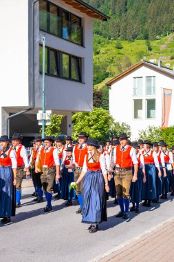 Grossarl, Austria - June 19, 2022: The traditional Carnival Procession in Grossarl attracted a huge number of participants and visitors in Grossarl, Austria. High quality photo