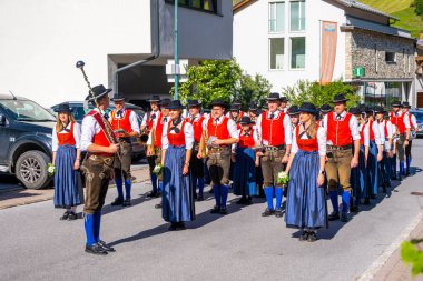 Grossarl, Austria - June 19, 2022: The traditional Carnival Procession in Grossarl attracted a huge number of participants and visitors in Grossarl, Austria. High quality photo