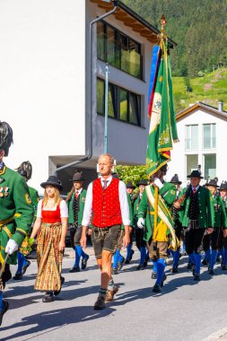 Grossarl, Austria - June 19, 2022: The traditional Carnival Procession in Grossarl attracted a huge number of participants and visitors in Grossarl, Austria. High quality photo
