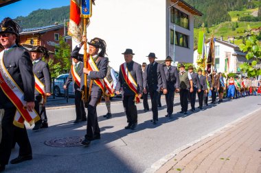 Grossarl, Austria - June 19, 2022: The traditional Carnival Procession in Grossarl attracted a huge number of participants and visitors in Grossarl, Austria. High quality photo