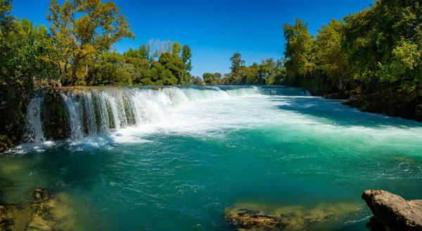 Beautiful natural landmark of manavgat waterfall with waterfall lake landscape near Manavgat city, Turkey. High quality photo