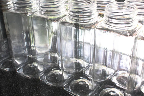 Many Empty Bottles Stand Neatly Aligned Light Front Patterned Pitch — Stock Photo, Image