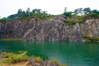 Pond formed in a given up quarry in Western Ghats