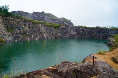 Pond formed in a given up quarry in Western Ghats