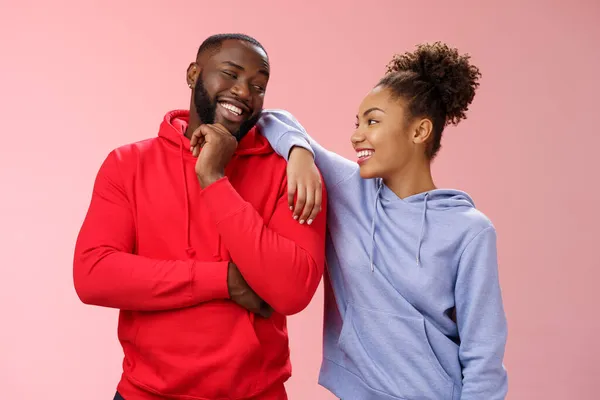 Two best friends having fun man smiling woman leaning his shoulder talking laughing joking like spending time together, standing pink background chit-chat confident relaxed poses — Stock Photo, Image