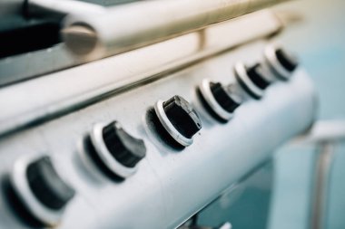 Yakın plan odaklı Barbekü Çelik Gaz soba düğmesi.