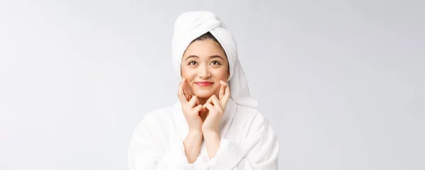 Spa skincare beauty Asian woman drying hair with towel on head after shower treatment. Beautiful multiracial young girl touching soft skin — 스톡 사진