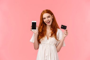 Heyecanlı, şımarık, kaygısız, kızıl kıvırcık saçlı, internet mağazasında para harcamak gibi, sipariş veren, uçuş uygulamasında bilet alan, kredi kartı ve akıllı telefon kullanan, cep telefonunda tanıtım yapan,.