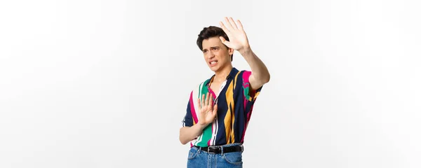 Timid Displeased Androgynous Man Asking Stop Raising Hands Defensive Grimacing — Stock Photo, Image