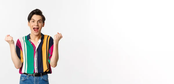 Image Successful Young Man Achieve Goal Clench Raised Fists Looking — Stock Photo, Image